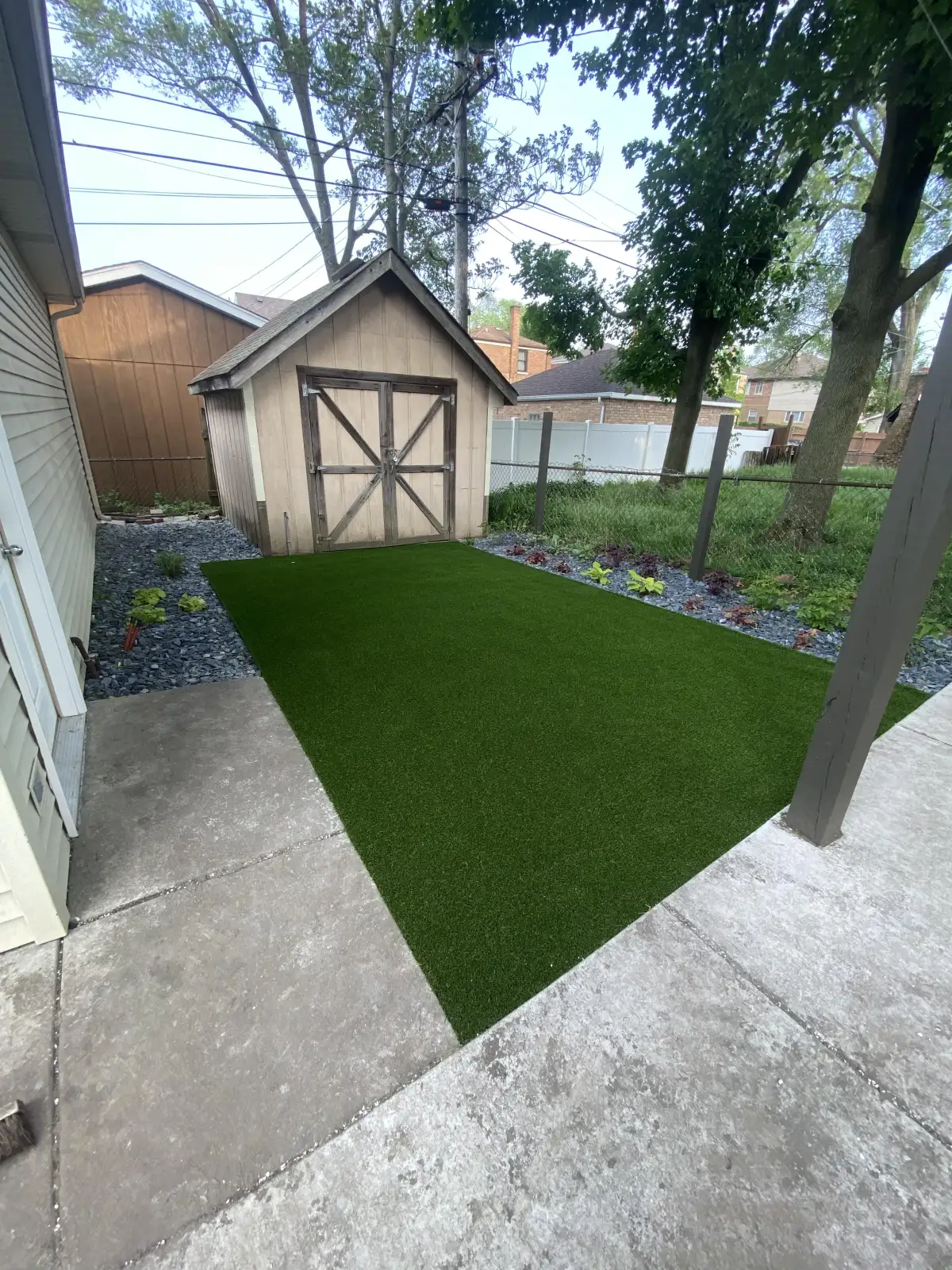 Completed artificial turf installation for a Benton Harbor property