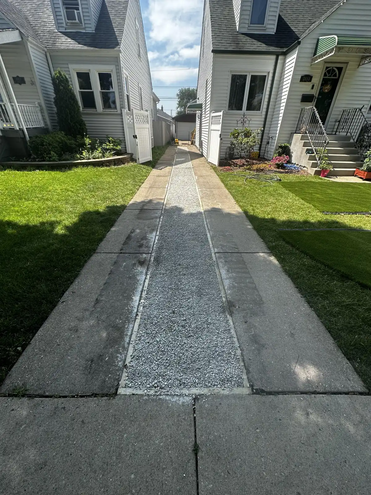 Grading and drainage stone base installation for a residential project